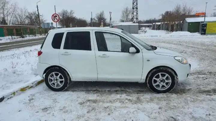 Samolet Mazda Demio