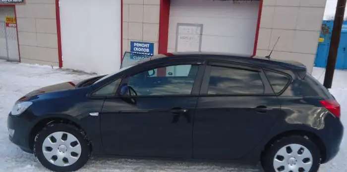 Опель Астра GTC 2011 Opel Astra