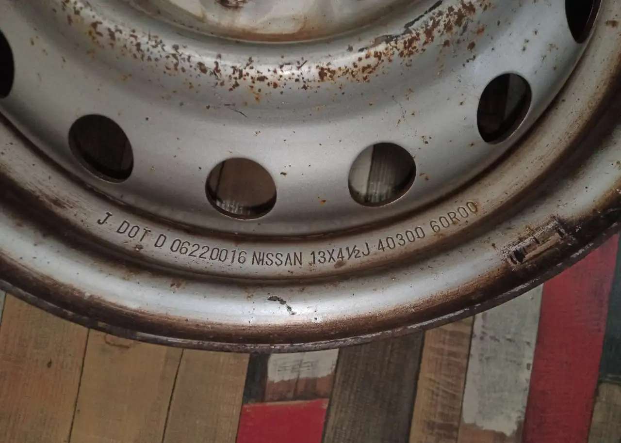 Диск колесный оригинальный R13 NISSAN штамповка
